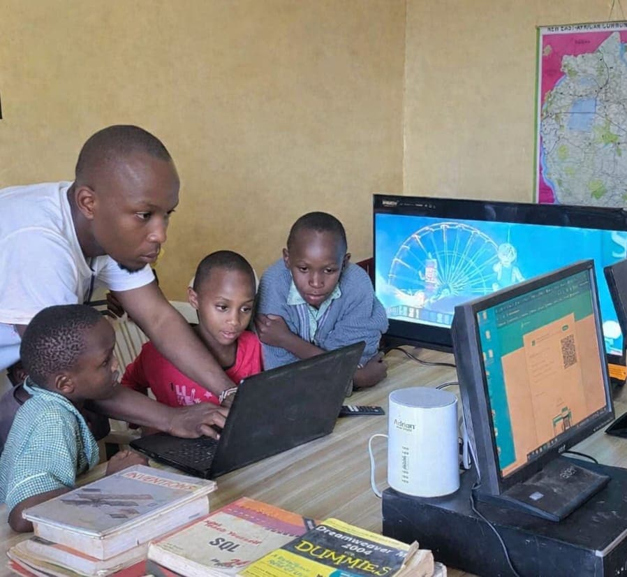 Students learning at the village computer lab.