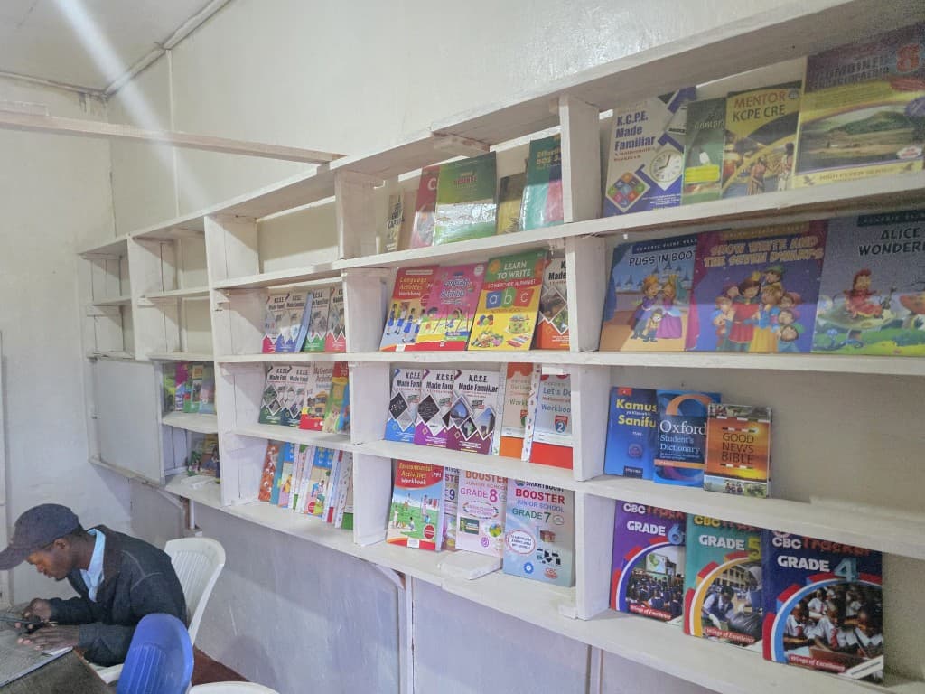 Books lining the PKN library shelves.