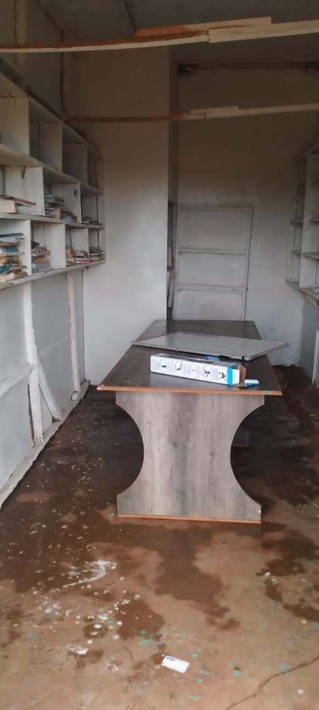 Shelving and desks take shape as the library room is fitted out.
